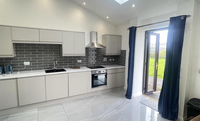 Full fitted kitchen, with all moden faciltes and underfloor heating.  Dinning table suitable for the family.